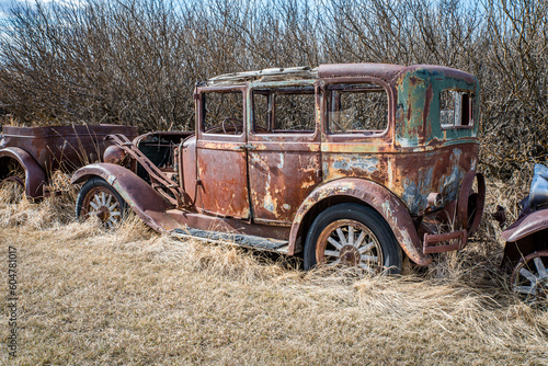 The body of an abandoned vintage car on the prairies in Saskatchewan