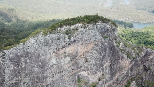 Aerial circling the upper peak of Pages Pinnacle from the southern side. photo