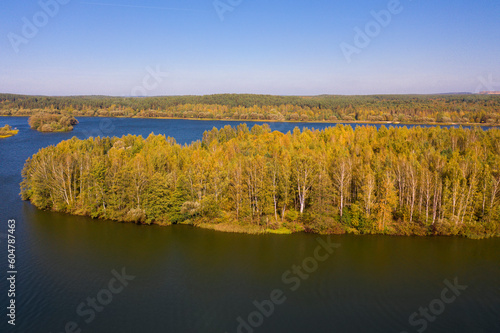 An aerial panoramic view on an autumn lake