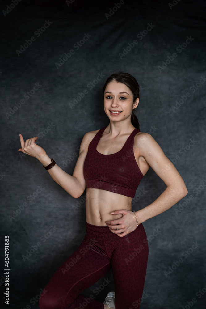 Attractive fitness woman wear sport cloth bra posign at studio, isolated Attractive fitness woman wear sport cloth bra posign at studio, isolated