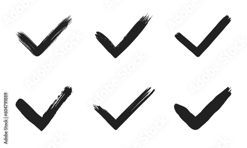 Dirty grunge hand drawn tick v with brush strokes vector illustration set isolated on white background graphic design. Check mark symbol YES button for vote in check box, web, etc.