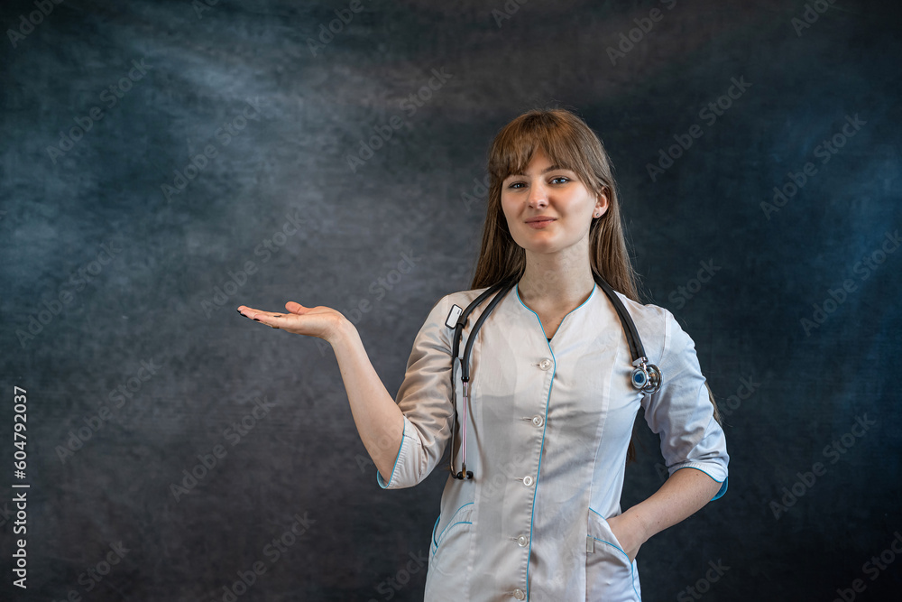 beautiful doctor in white uniform medical lab coat showing with hand and pointing with finger beautiful doctor in white uniform medical lab coat showing with hand and pointing with finger