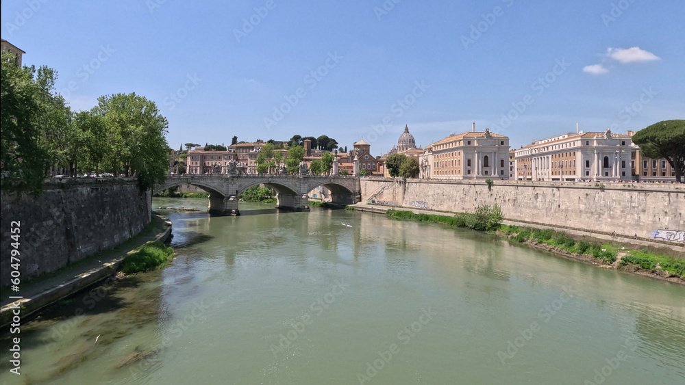 View of the Tiber River which crosses the Italian capital near the most important monuments in Rome.