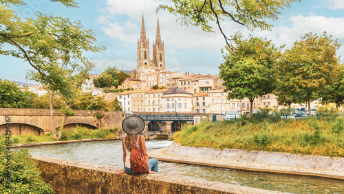 Photos Woman tourist in France- Niort, quay of Sevre river- Poitou Charente region