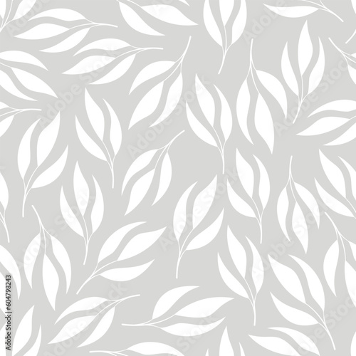 Seamless vector pattern. White plant silhouettes on a gray background 
