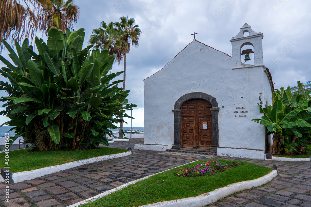 Fototapeta premium Puerto de la Cruz, Tenerife, Spain - december 20th 2021 - Building weathering by the Atlantic Ocean. The effects of nature on man made constructions