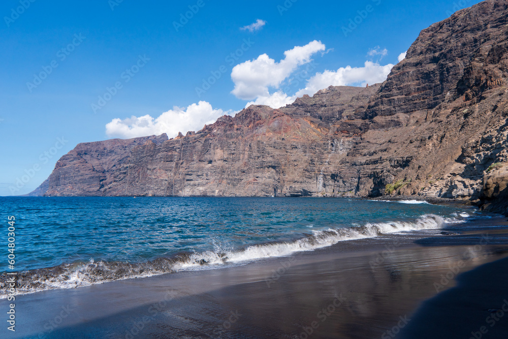 Colorful sight of the cliffs by the ocean, Los Gigantes - Acantilados de Los Gigantes, Spain, Tenerife island, Canary islands Colorful sight of the cliffs by the ocean, Los Gigantes - Acantilados de Los Gigantes, Spain, Tenerife island, Canary islands