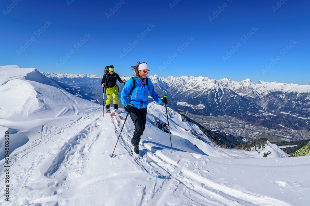 Austria, Tyrol, Skiers on snowcapped top of Kellerjoch mountain Austria, Tyrol, Skiers on snowcapped top of Kellerjoch mountain