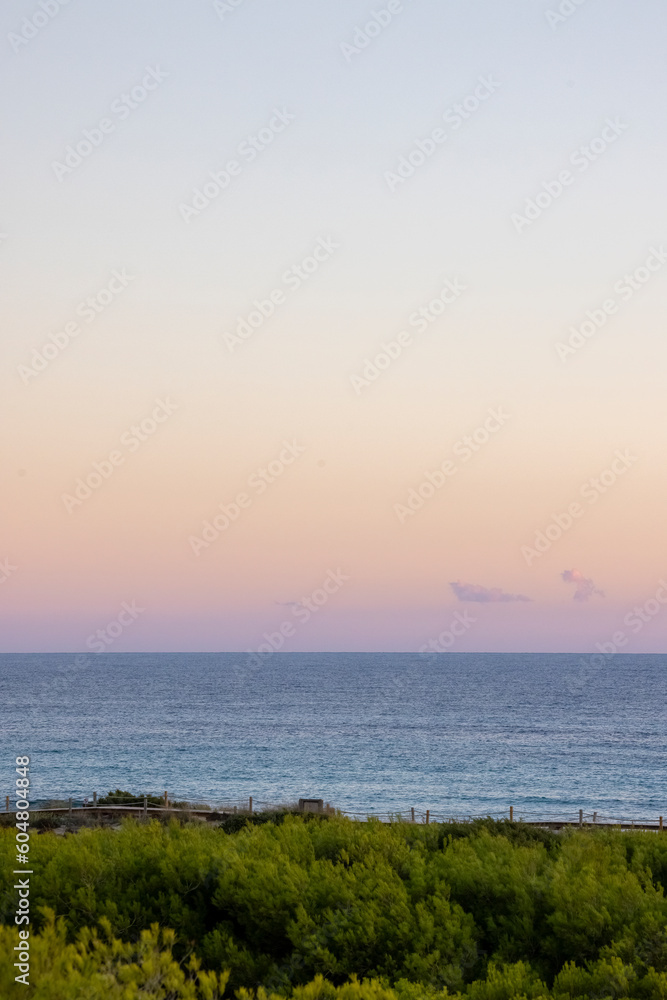 Spain, Balearic Islands, Formentera, Sky over Mediterranean coast at dusk Spain, Balearic Islands, Formentera, Sky over Mediterranean coast at dusk