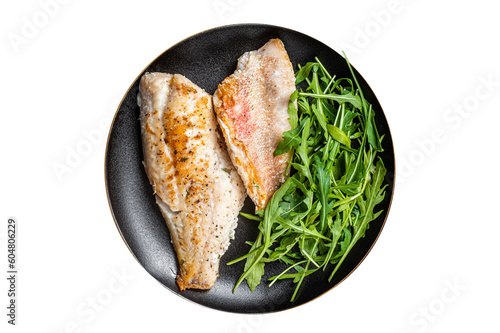 Photo Roasted Snapper, sea red perch fillet on a plate with salad