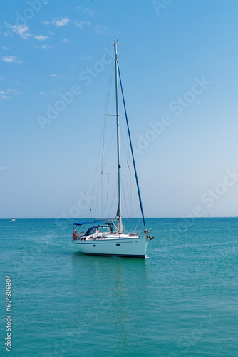 Small yacht sailing in a sea