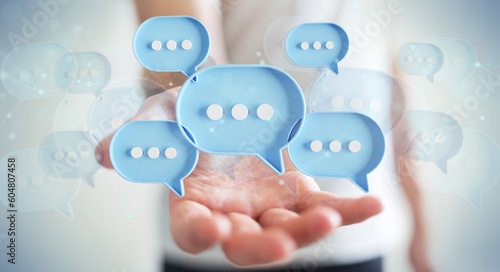 Wallpaper Mural Businessman using digital speech bubbles talk icons. Minimal conversation or social media messages floating over user hand. 3D rendering Torontodigital.ca