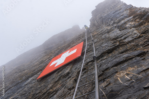 Young man climbing in the mountains, Switzerland, Klettersteig Leukerbad Daubenhorn