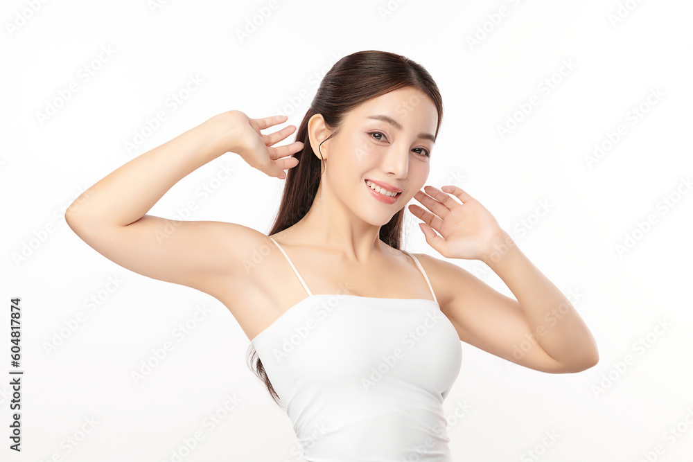 Beautiful Young Asian woman lifting hands up to show off clean and hygienic armpits or underarms on white background, Smooth armpit cleanliness and protection concept Beautiful Young Asian woman lifting hands up to show off clean and hygienic armpits or underarms on white background, Smooth armpit cleanliness and protection concept