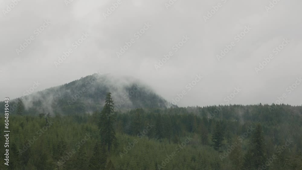 A mist-covered mountain stands tall, its peaks veiled in ethereal beauty. An air of enchantment surrounds it, inviting awe and capturing the imagination. A mist-covered mountain stands tall, its peaks veiled in ethereal beauty. An air of enchantment surrounds it, inviting awe and capturing the imagination.