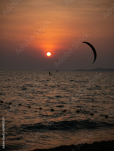 Photos of the sunset on the sea at Jomtien Beach Thailand. © KUNVEE