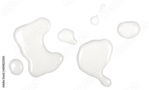 Obraz na płótnie Spilled milk puddle isolated on white background and texture, top view