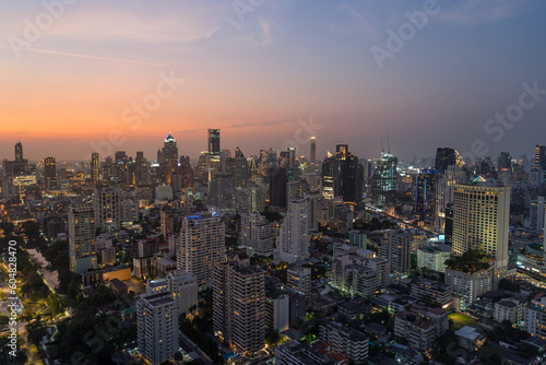 Skyline panorama of Illuminated Bangkok city metropolis in twilight during the sunset. Panoramic cityscape urban of modern city on dusk. High-angle view