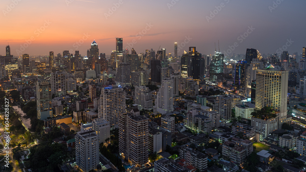 Obraz premium Skyline panorama of Illuminated Bangkok city metropolis in twilight during the sunset. Panoramic cityscape urban of modern city on dusk. High-angle view