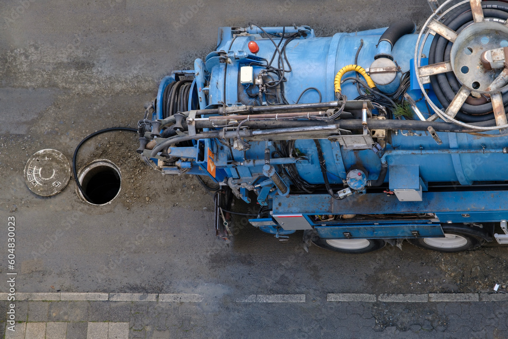 top view of sewer cleaning vacuum truck. Selective Focus Vehicle. On Street. top view of sewer cleaning vacuum truck. Selective Focus Vehicle. On Street.
