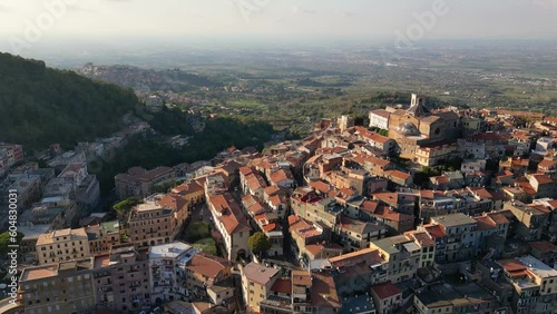 This aerial drone video shows the small village of Monte Compatri. This town is located on a hill and you have a beautiful view over the countryside of Italy.  photo
