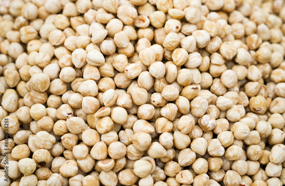 Shelled hazelnuts close-up. Nuts as background. Shelled hazelnuts close-up. Nuts as background.