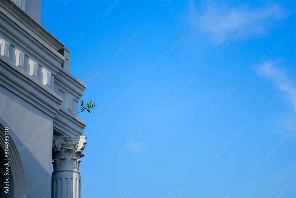 Church building wall, blue sky with cloud background Church building wall, blue sky with cloud background