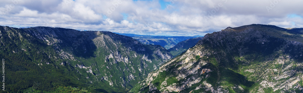 Panorama of mountain peaks. A beautiful screensaver for the site. Amazing nature.