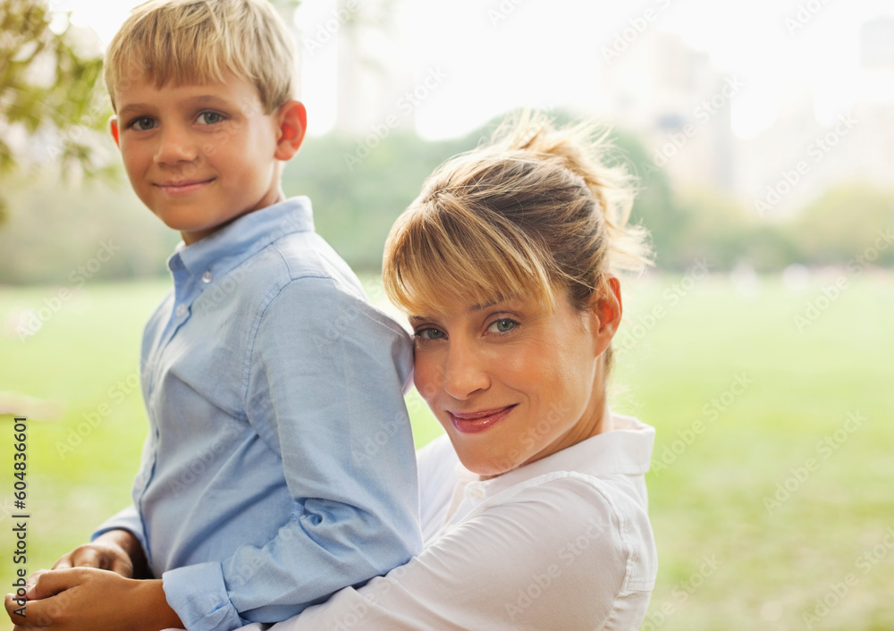 Mother and son relaxing in urban park Mother and son relaxing in urban park