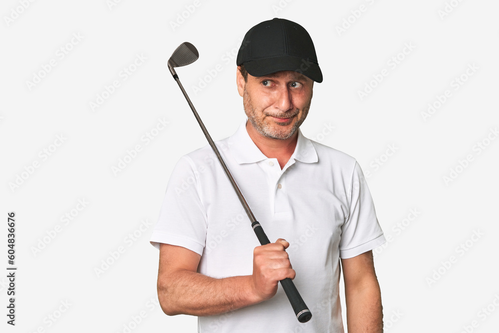 Middle aged golfer man biting fingernails, nervous and very anxious. Middle aged golfer man biting fingernails, nervous and very anxious.