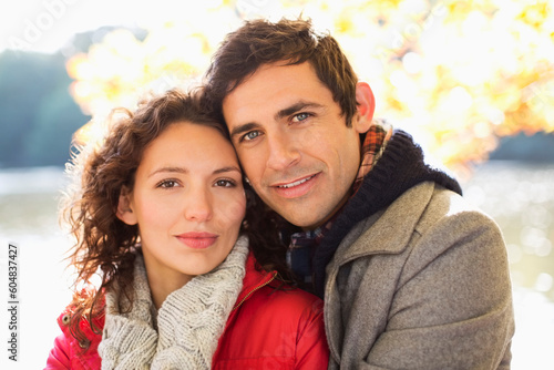 Couple hugging in park