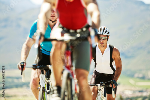 Cyclists in race in rural landscape