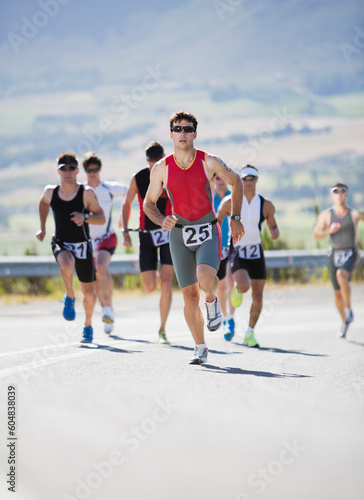 Runners in race on rural road