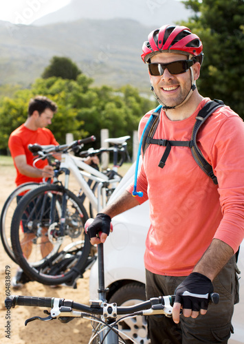 mountain biker smiling outdoors