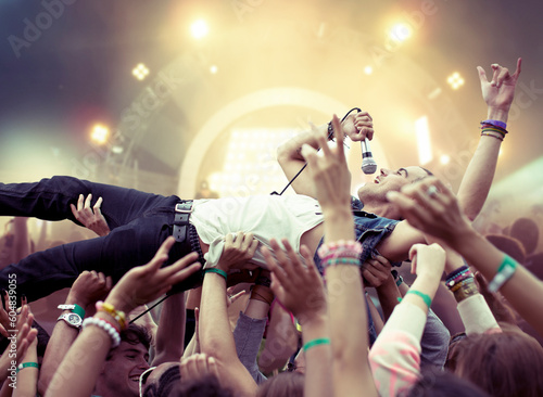 Canvas Print Performer crowd surfing at music festival