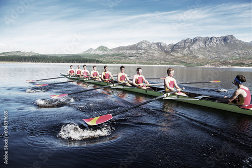Canvastavla Rowing team rowing scull on lake