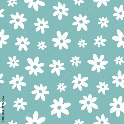 Seamless pattern with cute white flowers and green background