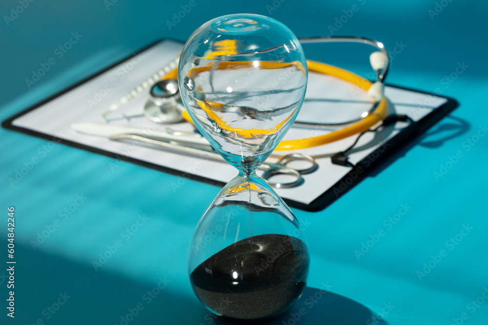Doctors are working to develop new treatments that can extend more time to people's life. With the help of medicine, people are living longer, healthier lives. stethoscope on blue background Doctors are working to develop new treatments that can extend more time to people's life. With the help of medicine, people are living longer, healthier lives. stethoscope on blue background
