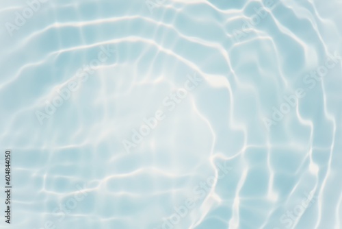 Fototapeta Naklejka Na Ścianę i Meble -  Blue water with ripples on the surface. Defocus blurred transparent blue colored clear calm water surface texture with splashes and bubbles. Water waves with shining pattern texture background.