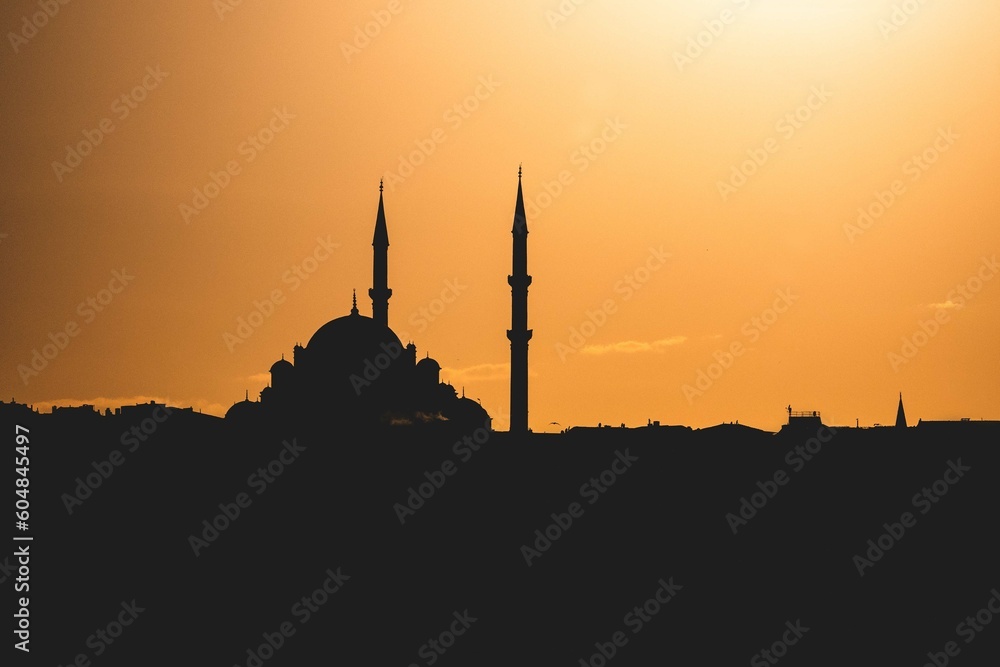 View on a mosque at sunset from Karaköy  docks, in the city of Istanbul, Turkey