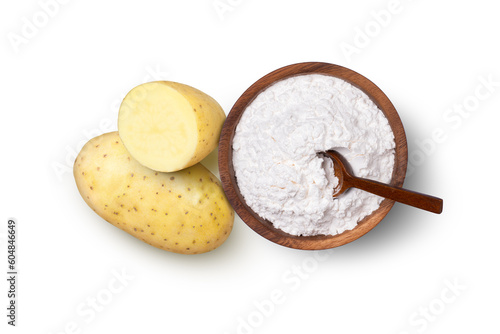 Potato starch (ground potato) in wooden bowl and fresh potatoes with slice isolated on white background. Top view. Flat lay.