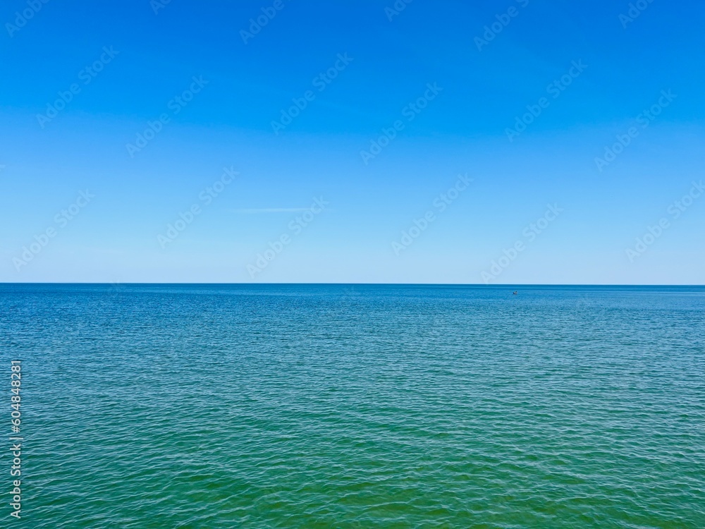 Natural sea pebbles, wet pebbles, small pebble background