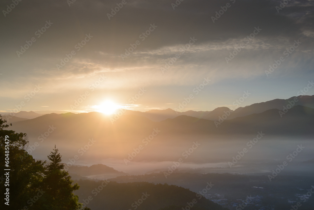 The sun was just above the ridgeline. Capture the sunrise and sea of clouds here. Jinlong Mountain, Nantou, Taiwan