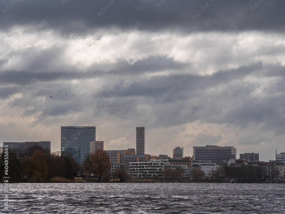 Hamburg Alster Canal drive with a view to the Boat and City