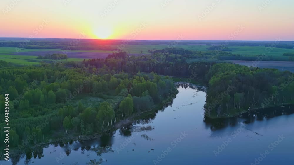 Aerial view over river of beautiful orange sunset Aerial view over river of beautiful orange sunset