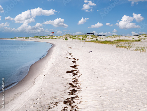 Beach and watchtower on coast of Marker Wadden island in Markermeer lake, Netherlands