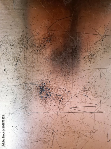Foto evocative ruined copper surface textures
from scratches and nicks