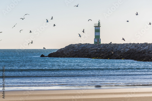 Lighthouse on Cabedelo Beach in Viana do Castelo, Portugal photo