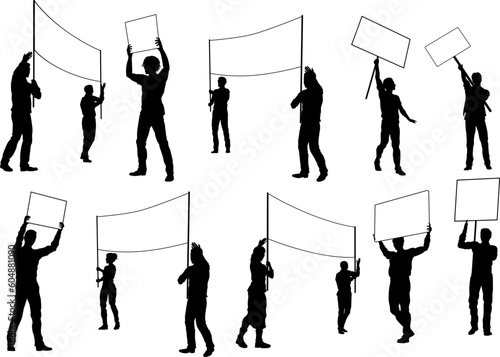 Protestors or demonstrators men and women. At a demonstration march, picketing line or strike protest rally in silhouette. Holding banners, picket signs and megaphone or mega phone.