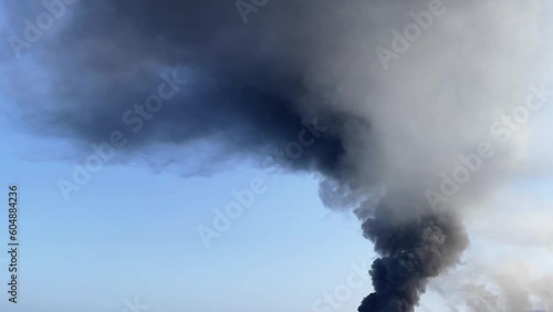 AirStrike Bomb Explosion, fire.Black, dense and thick smoke column photo